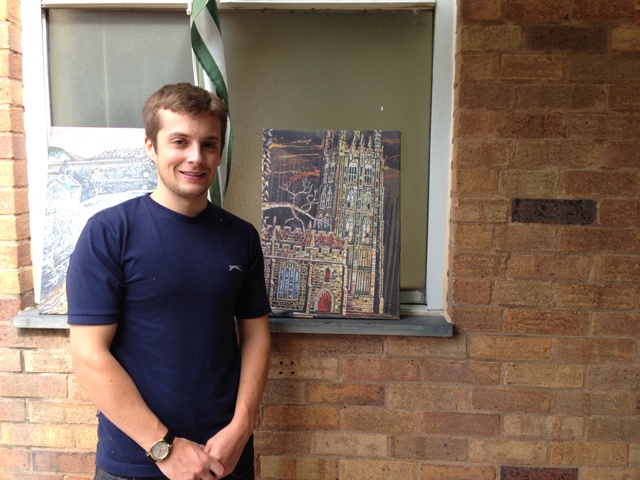 Artist Mikey Jones with his portrait of St. Giles Church