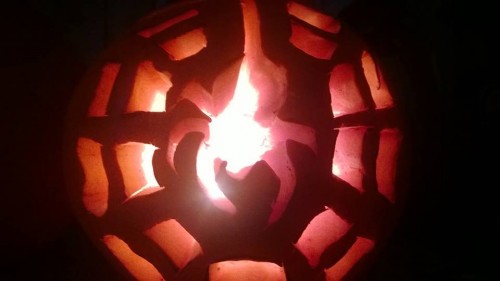 Janine Martin sent us this great spider and web pumpkin carving